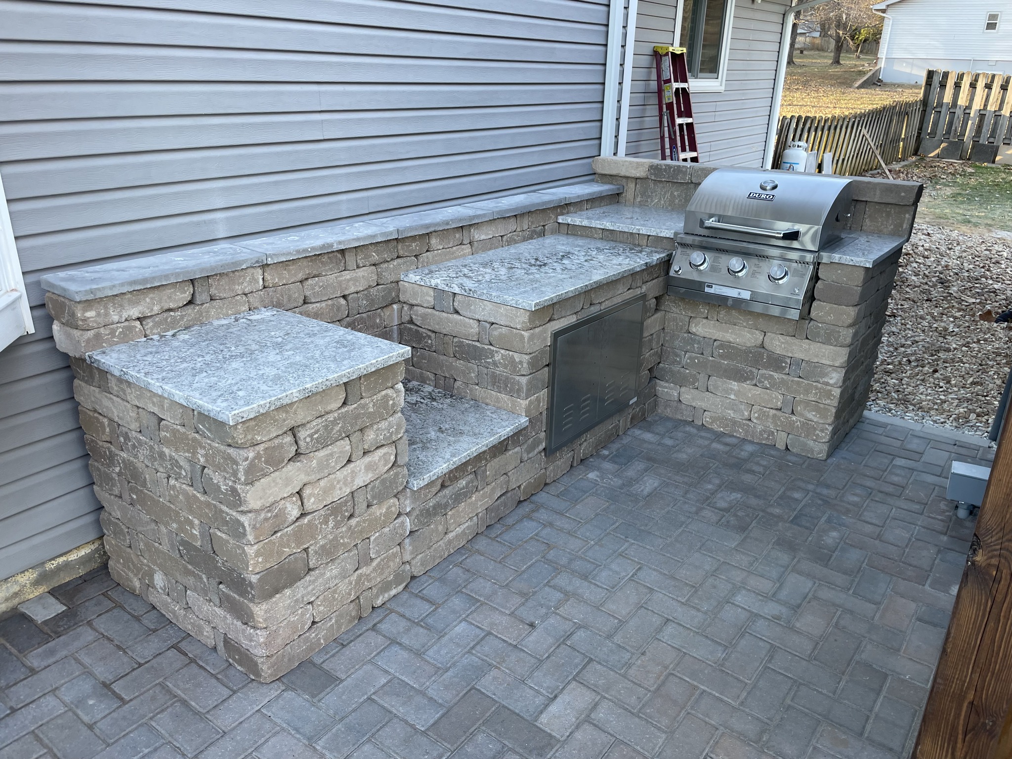 Professional outdoor kitchen and living space built by Maxwell Outdoor Design